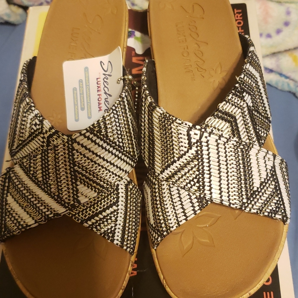 Black and white skechers wedges
